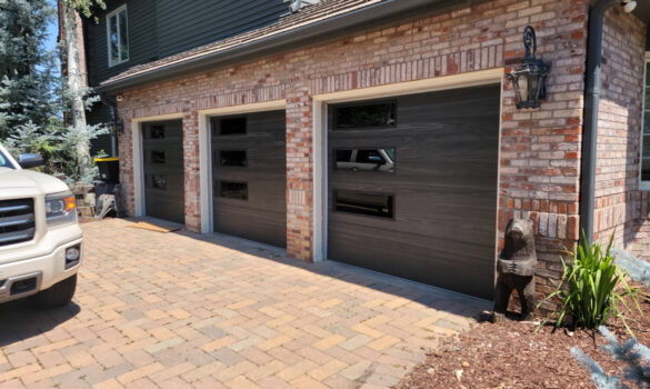 Picture of beautiful new garage doors that were recently installed on a home.